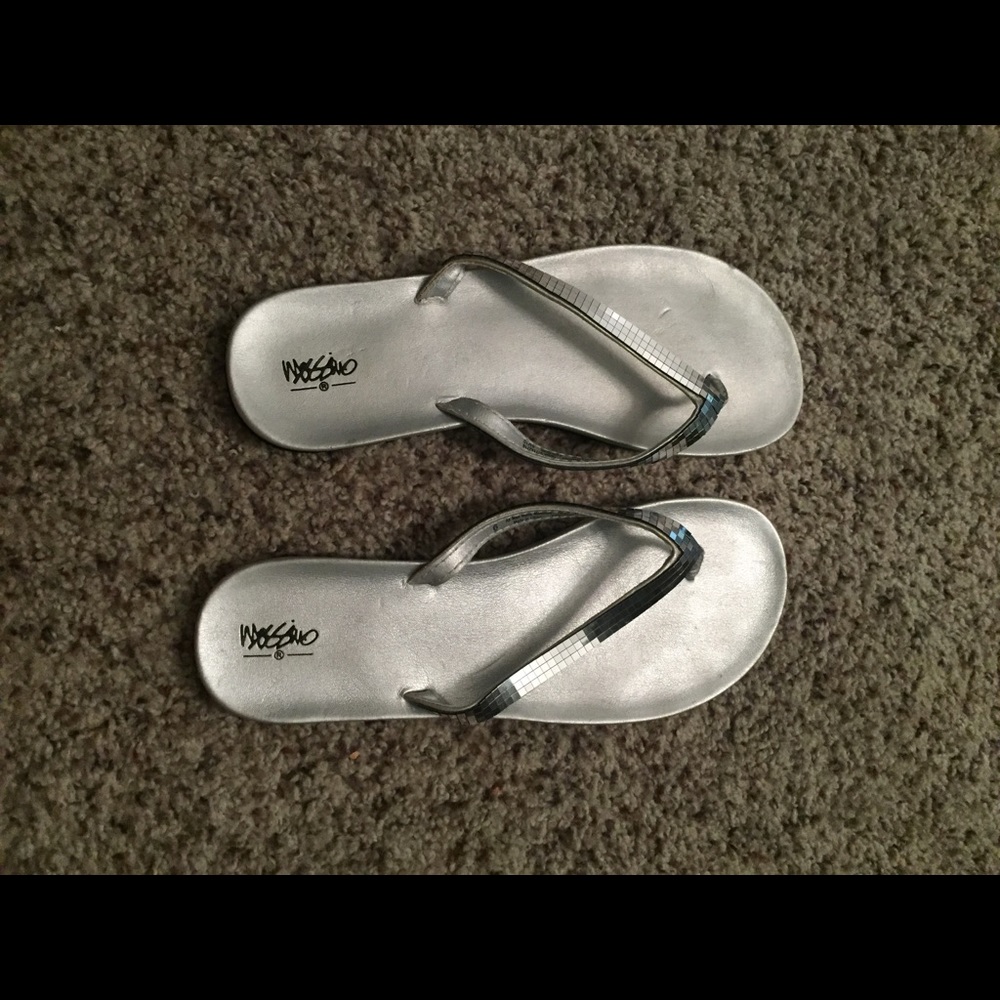 Shiny silver flip flops, size 6
